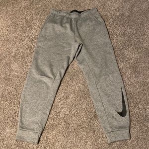 Medium Gray Nike Dri-Fit jogger sweatpants.